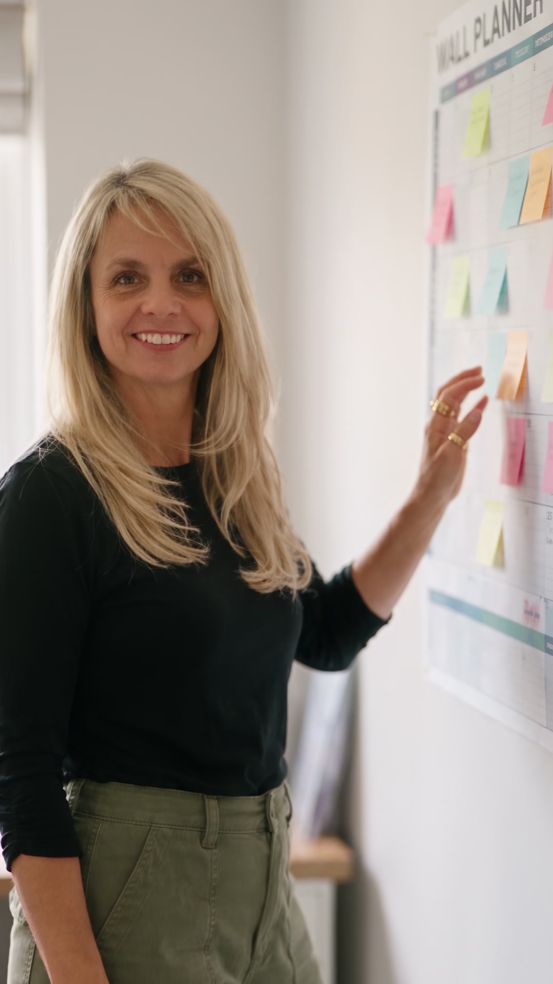 Coral at her wall planner